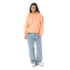 Person wearing a peach hoodie and blue jeans on a white background